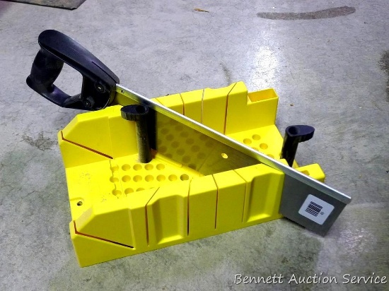 Stanley miter box measures 7" x 12"; comes with miter saw.
