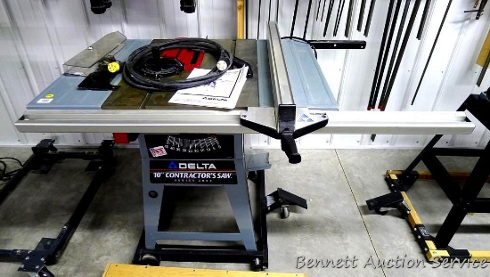 Delta 10" Contractor's Table saw Series 2000 on rolling cart. Saw is in very nice shape. Comes with