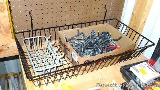 Peg board hooks and baskets of various sizes. Large basket is 12" x 23".
