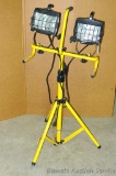Two halogen work lights on an adjustable work stand. Lights don't work, but may just need new bulbs.