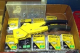 Stanley swivel head rivet gun and assorted rivets.