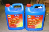 Full gallon Napa 50/50 antifreeze mix; short gallon of antifreeze hand labeled 'Mixed'