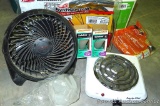 Honeywell desk fan, Proctor Silex hot plate, a couple of light bulbs, some new packages of