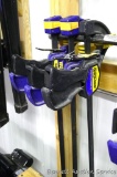 Three Quick-Grip bar clamps, longest are 45
