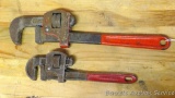 Two pipe wrenches. Largest is 14