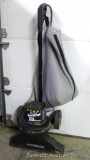 Shop Sweep indoor/outdoor vacuum by ShopVac with collection bag. Runs.