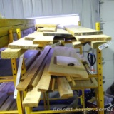 Hardwood, softwood and some treated lumber. Widest is 13-1/2
