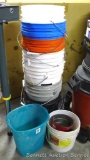 Stack of buckets, plus a wastebasket. Stack is 39