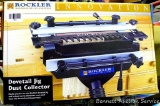 Rockler dovetail jig dust collector, new in box.