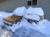 Several wooden and plastic pallets up to 4' x 3'4