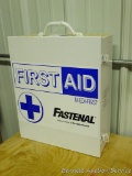 Fastenal First Aid kit, includes bandages, gauze pads, Q-tips, burn spray and more.