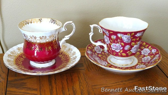 Two English bone china teacups with saucers. Floral patterned cup is marked 'Royal Albert Balmoral'.