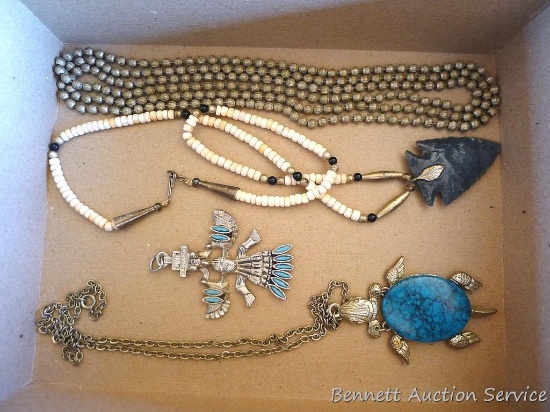 Southwest themed necklaces and a pendant. Longest necklace is about 27" and has small metal beads-