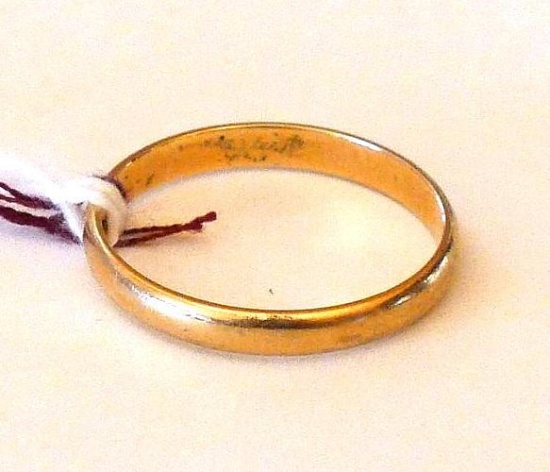 14K gold wedding band is size 10. Ring weighs 2.3 grams.