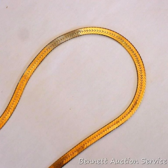 Necklace is marked J 14K on the flat end loops of the chain. Necklace weighs 27.5 grams and is 14"