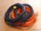 Four extension cords. Two have female ends cut off.