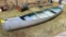 Smoker-Craft 16' aluminum canoe. Side has been repaired a bit.