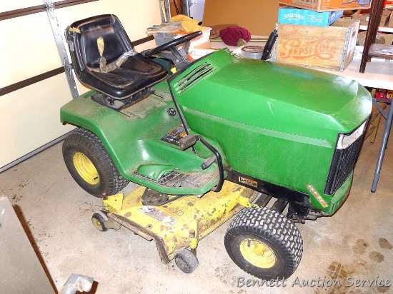 John Deere riding mower with K Series 17 hp liquid cooled V twin Kawasaki engine and 48" mower deck.