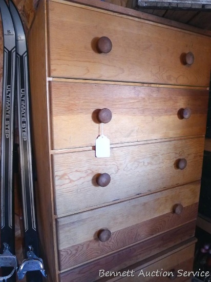 Little four drawer dresser is in good condition. Measures 36" high x 28" wide x 15" deep. Matches