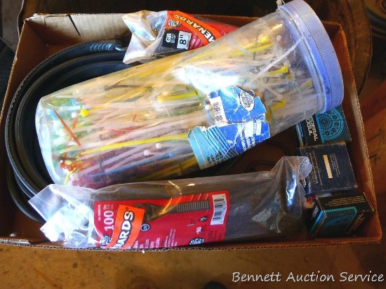 Nice quantity of zip ties, rubber bungee straps, some bearings.