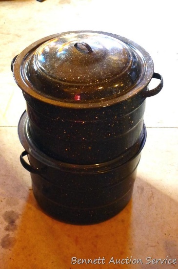 Two enameled water bath canners with racks.