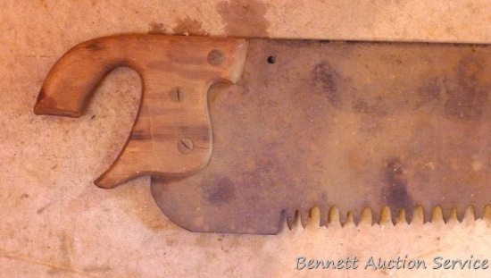 Single man cross cut saw is nearly 6' long.