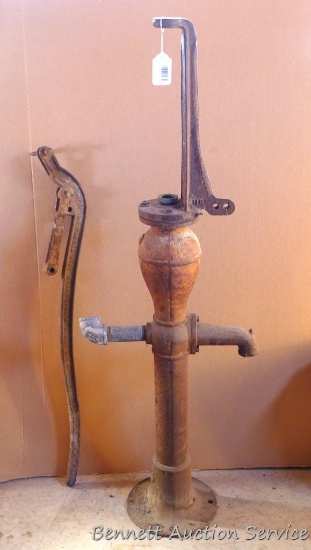 Cast iron pump 53" tall has parts missing. Handle 40" long.