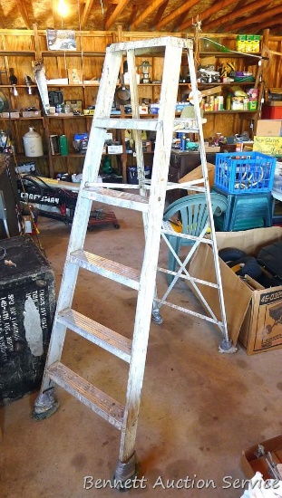 Six foot aluminum step ladder.