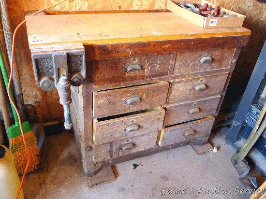 Antique workbench with word working vise measures 42" x 22" x 34" high. Maple frame and drawers. Top