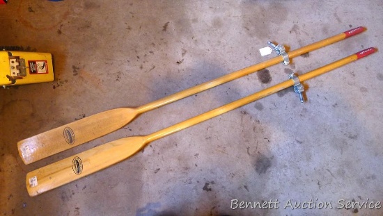 Pair of Feather Brand boat oars still have original UPC stickers, 6-1/2' long.