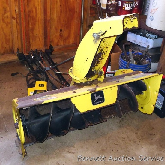 John Deere 3-1/2' snow blower attachment for lawn tractor, comes with extra belts.