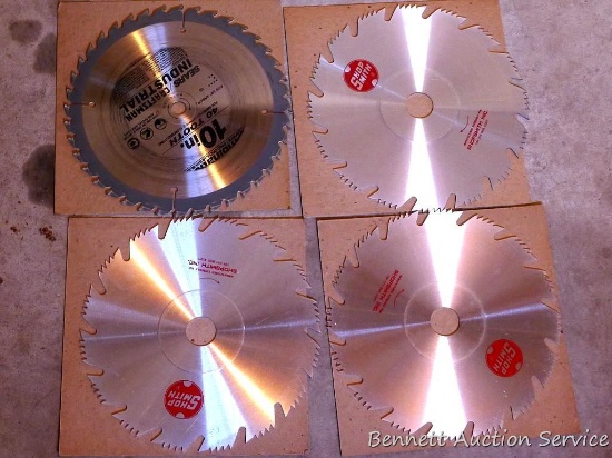 Three new Shop Smith 10" circular saw blades, plus Craftsman 10" carbide tipped blade.