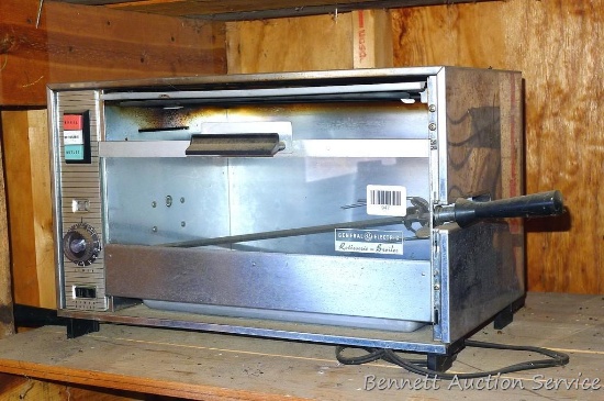 General Electric rotisserie / broiler with timed outlet measures 20" x 12" x 12". Super rocket age