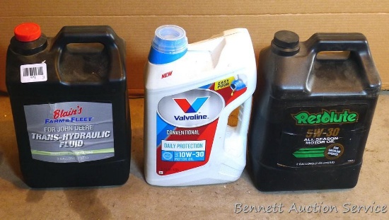 5 quart jug Valvoline 10W-30, unopened; around 1 gallon 5W-30; around 1 gallon John Deere
