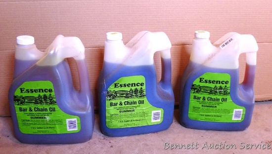 Nearly three gallons Essence bar and chain oil, summer weight.