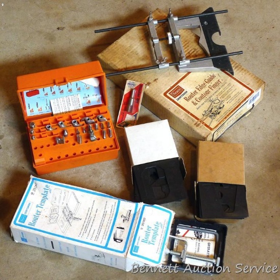 Assorted router bits, router template, Craftsman router edge guide, more.