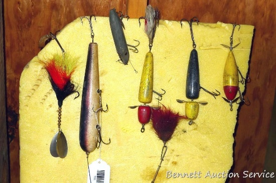Old fishing lures up to 10" long with hook.