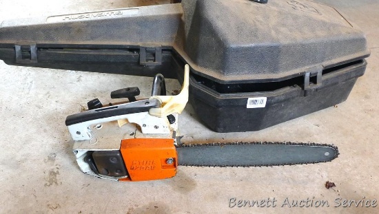 Stihl 020AV chainsaw with a 14" bar and case. Saw turns over and has compression. Gas tank is dry.