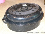 Large enameled roaster with lid is in good condition.