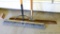 2-1/2' commercial push broom, plus a squeegee;