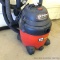 Shop-Vac 5 hp 12 gallon wet/dry vacuum with lots of hose. Runs and works, squeaks a little when it's