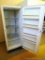 Wood's midsize upright freezer is 5' tall x 2' wide x 2-1/2' deep. Works. Comes with key to lock
