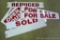 Aluminum signs including For Sale, Reduced, Open House and Sold. Largest is 36