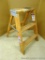 Sturdy wooden step stool in good condition is 22