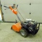 Husqvarna 900 DRT rear tine tiller with dual rotating tines. Comes with owner's manual. Runs.