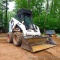 Watch the video.  Bobcat 773 skid steer loader comes with a 5'8