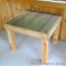 Sturdy wooden table is 25-1/2