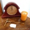Brownstone mantle style clock may just need a new battery; Sun Kissed scented candle in jar; Cross