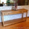 Wonderful sofa or hall table was handmade and is very sturdy, in good condition. Measures approx. 5'