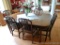 Very nice antique dining room table and chairs are in great shape. Six classic-style chairs are